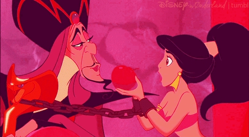 Jafar being reluctantly fed an apple by an enslaved Jasmine in Disney's Aladdin 