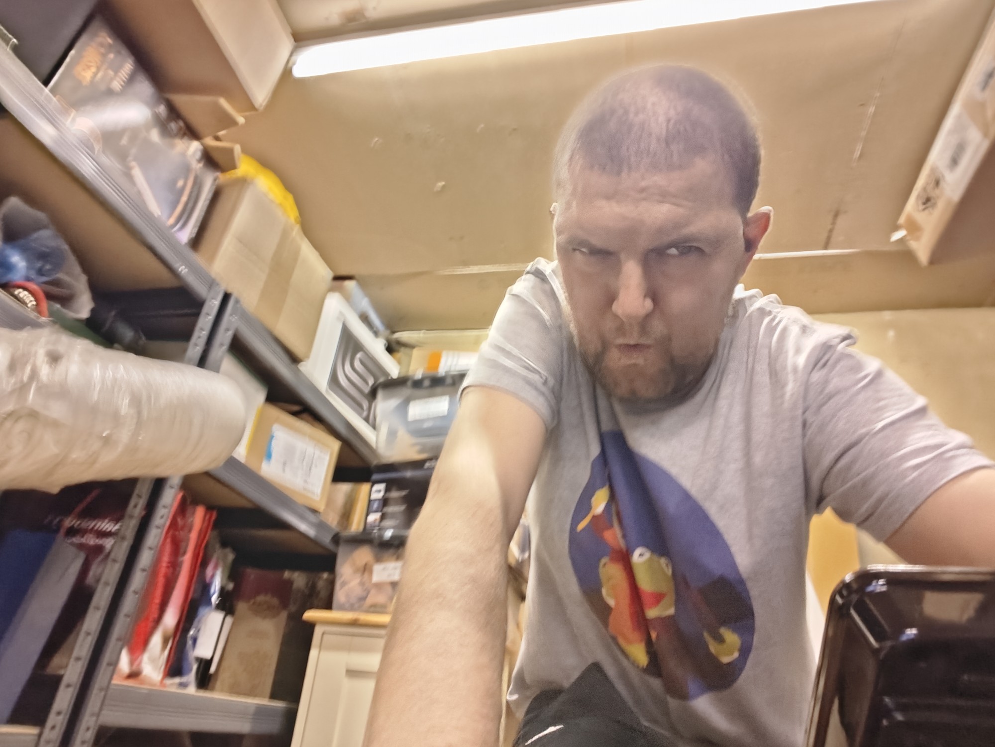 Me struggling on an exercise bike in a Muppet Christmas Carol t shirt. 