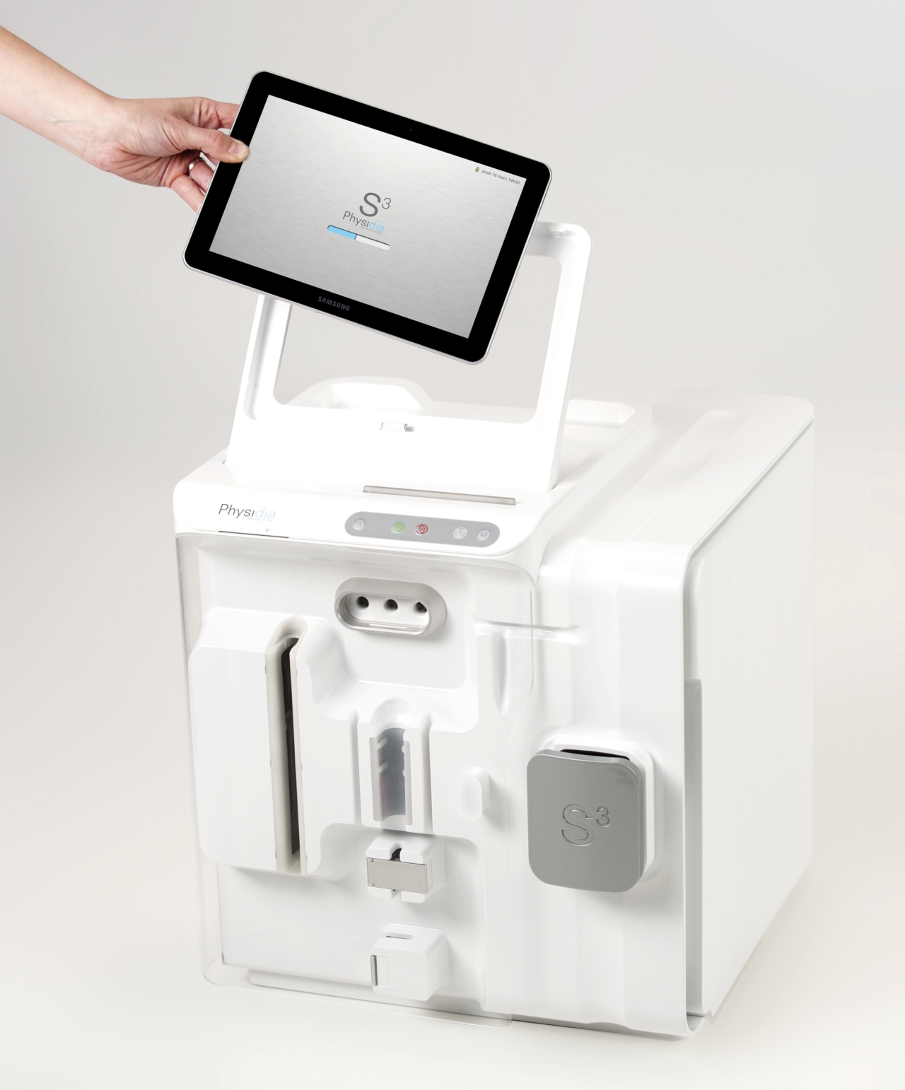 An image of a portable dialysis machine with a detachable screen 