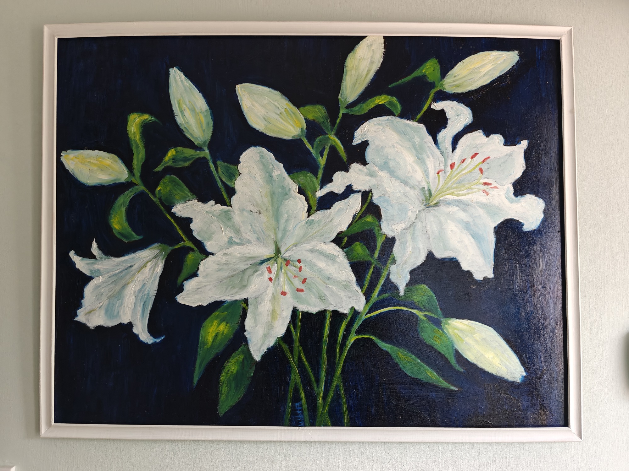 A painting of lilis on a dark blue background 