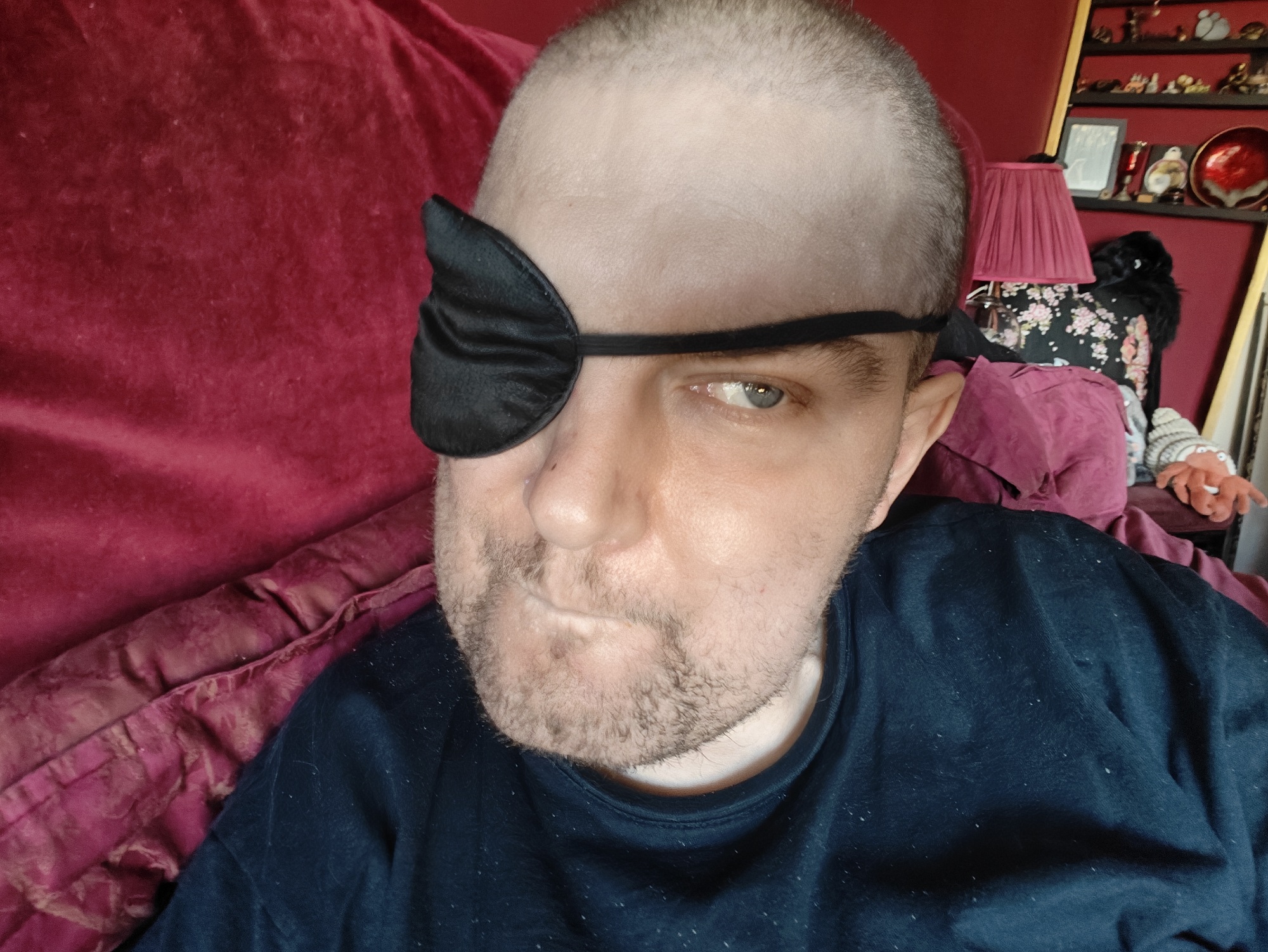 Me wearing an eye patch, looking like a pirate. I'm a 40-year old bald white dude