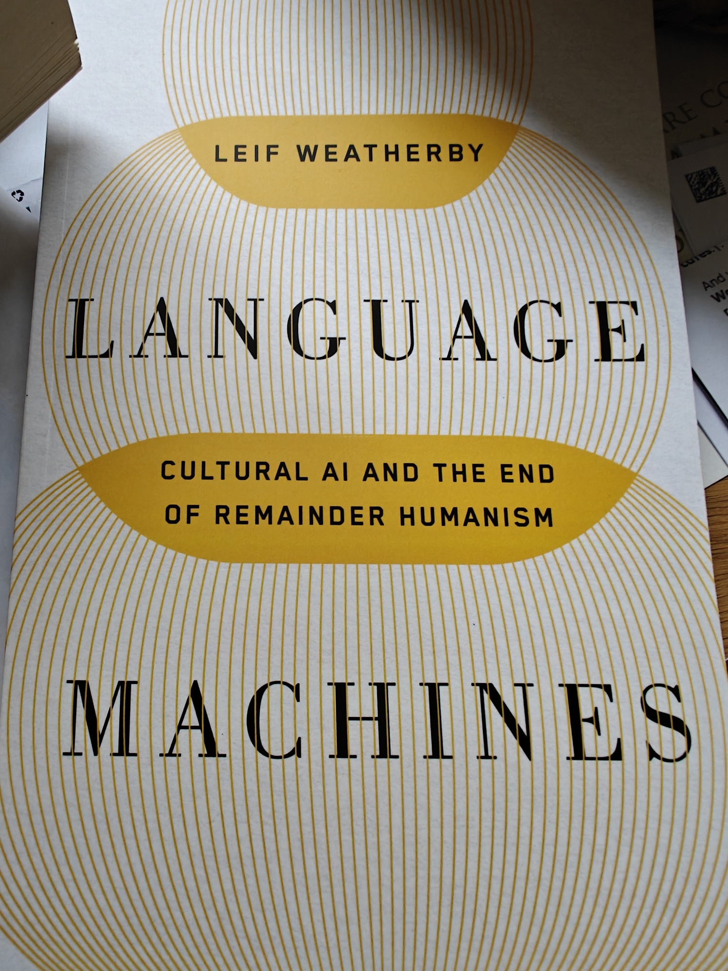 The front cover of Leith Weatherby's Language Machines book with some wire frame spheres on the front. 