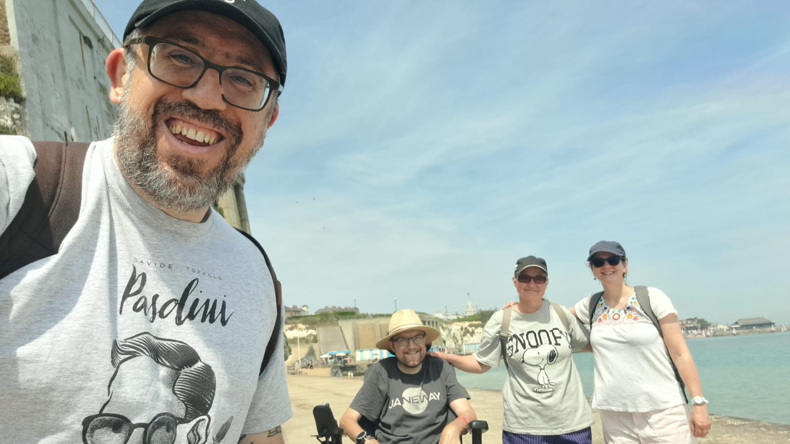 A photo of Ernesto Priego, Martin Eve, Helen Eve, and Lucy Morris at the seaside in Broadstairs