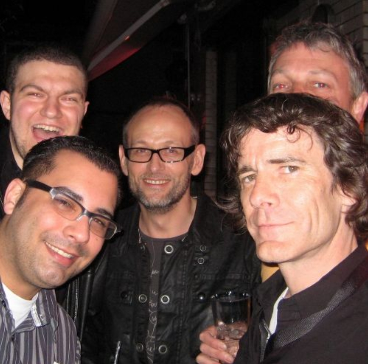 A photo of me with Fluke. I am back left, jUSTIN cREDIBLE is front right, then Mike Tournier stands smiling in the middle. Mike Bryant looks sceptical at the front right and Jon Fugler peeps over his head. I have my mouth wide open in delight. I was so pleased to get this photo with Fluke. 